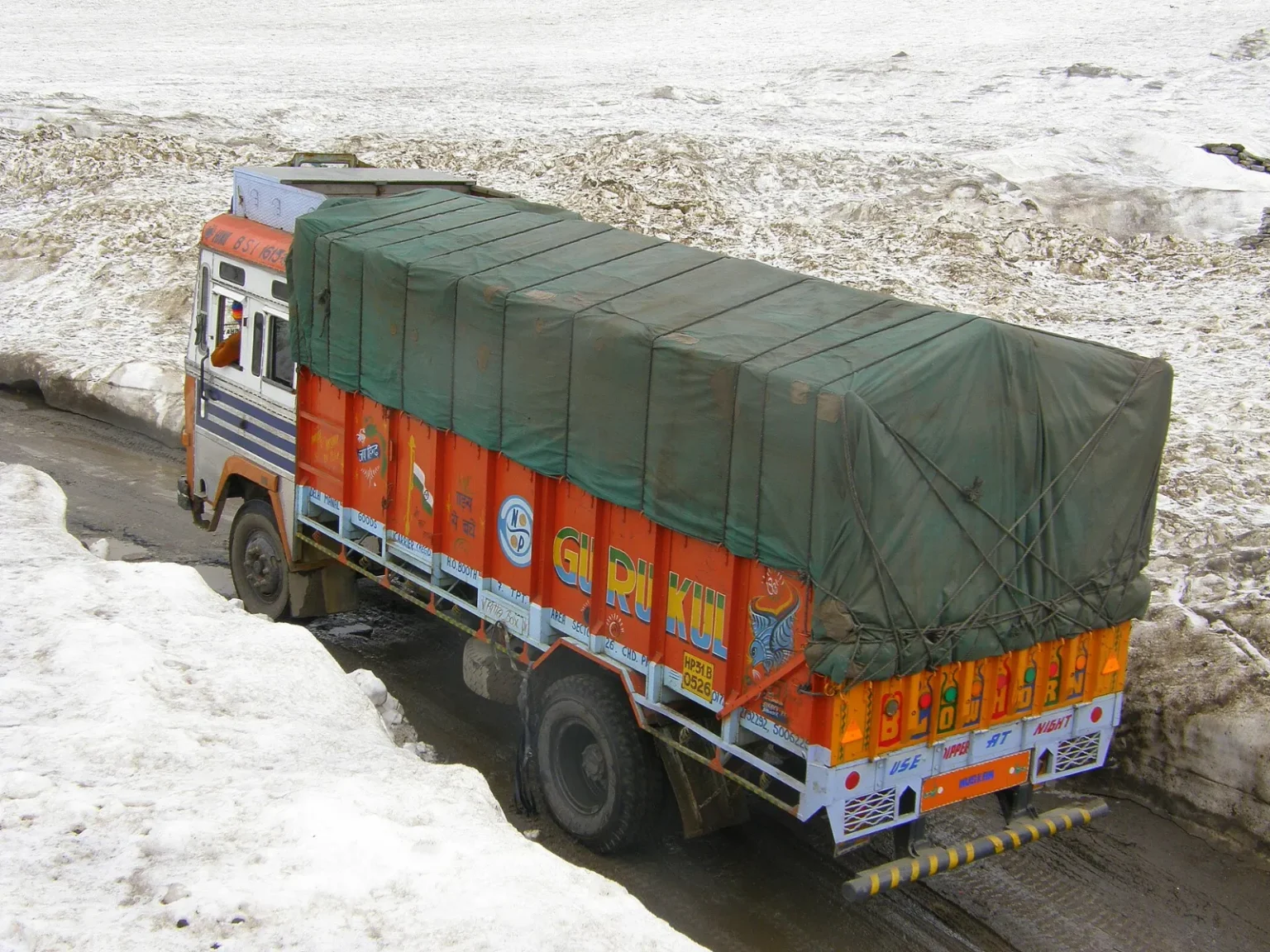 Loaded Ashok Leyland truck on a Himachal Pradesh mountain road