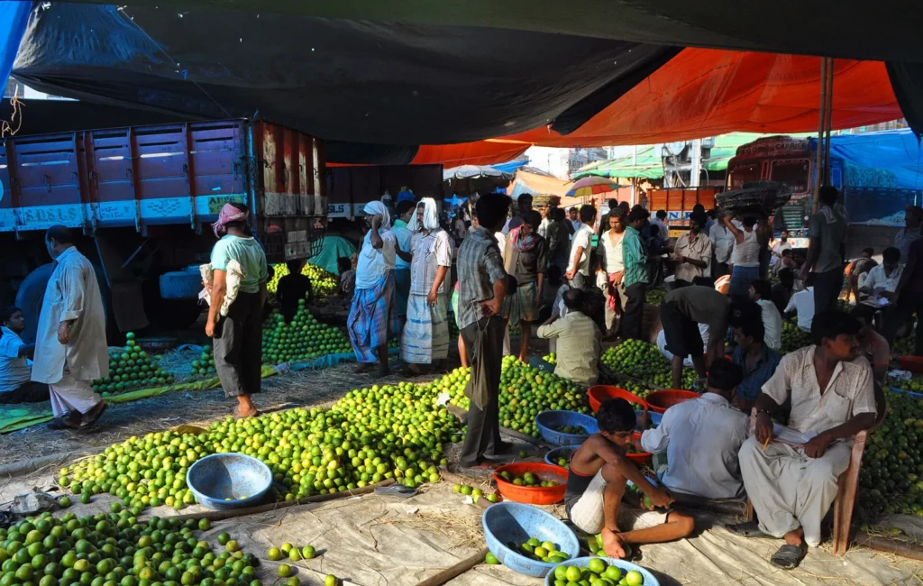 Traders at the wholesale fruit market in Kolkata